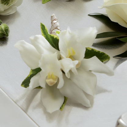 White Mini Cymbidium Boutonniere –  Friendly Flower Shop, San Angelo TX